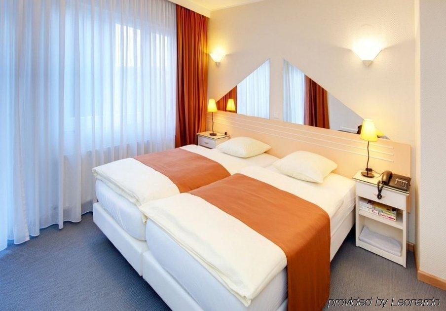 City Hotel Люксембург Стая снимка